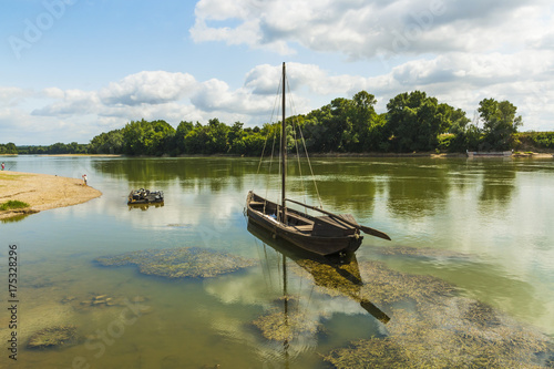 Old boat on the Garonne, a great French river, at this small town near Marmande, Couthures-sur-Garonne, Lot-et-Garonne, France photo