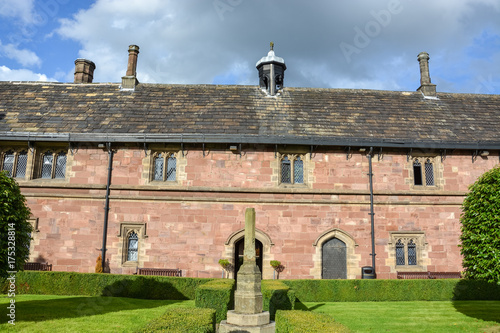 A nice square with trees and hedges next to Chetham's library in Manchester