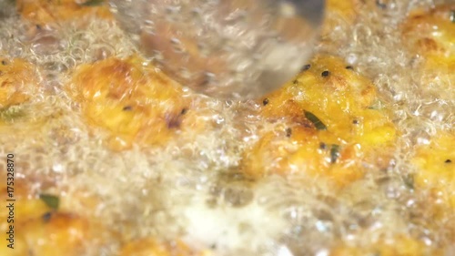 Extreme close up - Deep Frying Indian Pakoda photo