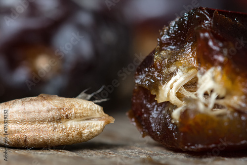 Dates on wooden background