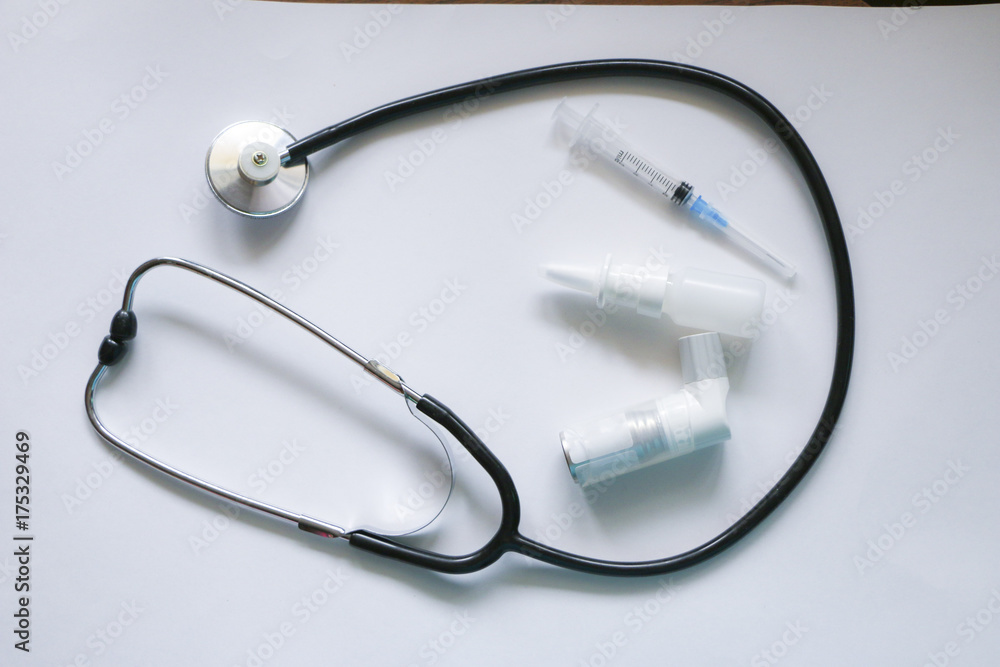 Stethoscope, syringe, inhaler, spray isolated on white background Stethoscope, syringe, inhaler, spray isolated on white background