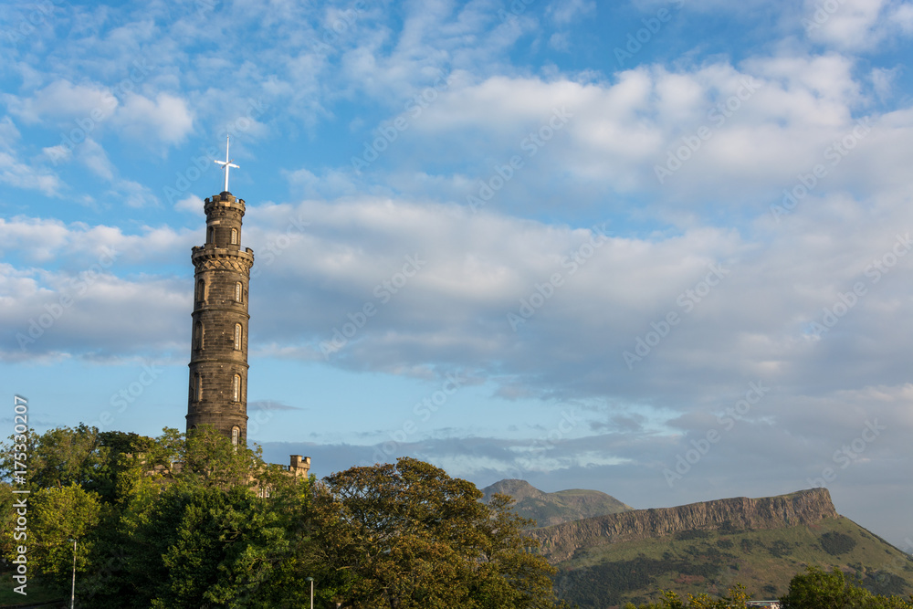 The Nelson monument on Calton Hill in Edinburgh with Arthurs Seat in the background