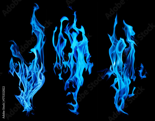 set of blue fire sparks on black background