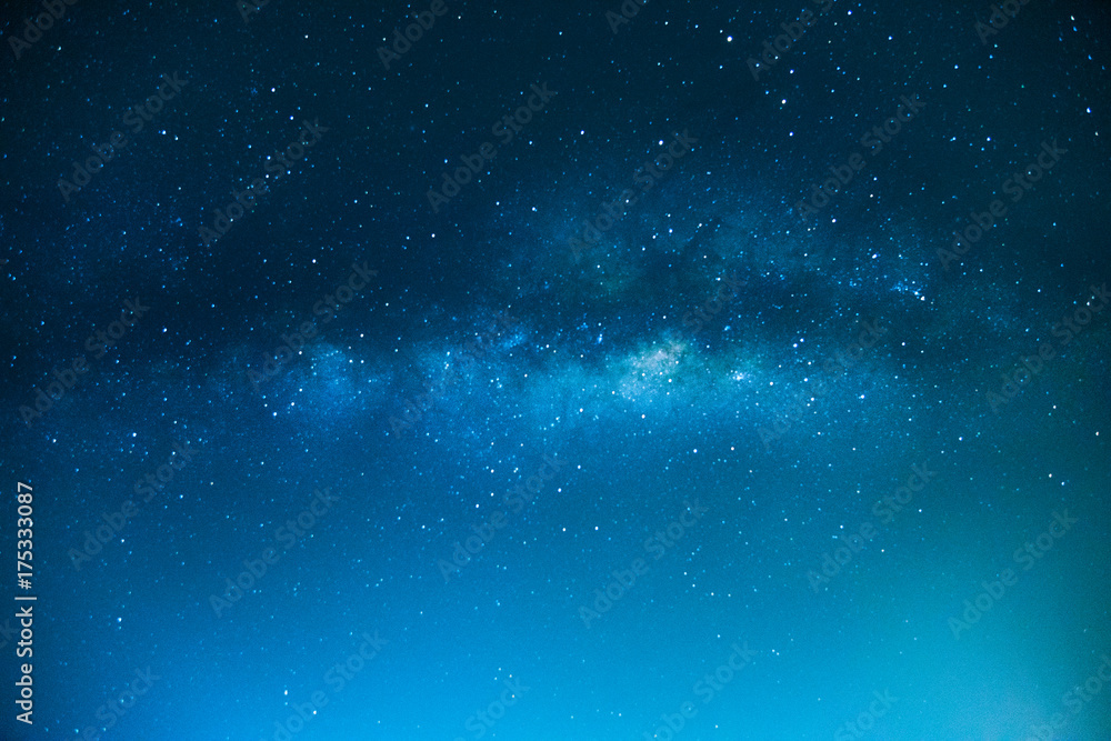 The Milky Way ,Long exposure photograph , Blue tone The Milky Way ,Long exposure photograph , Blue tone