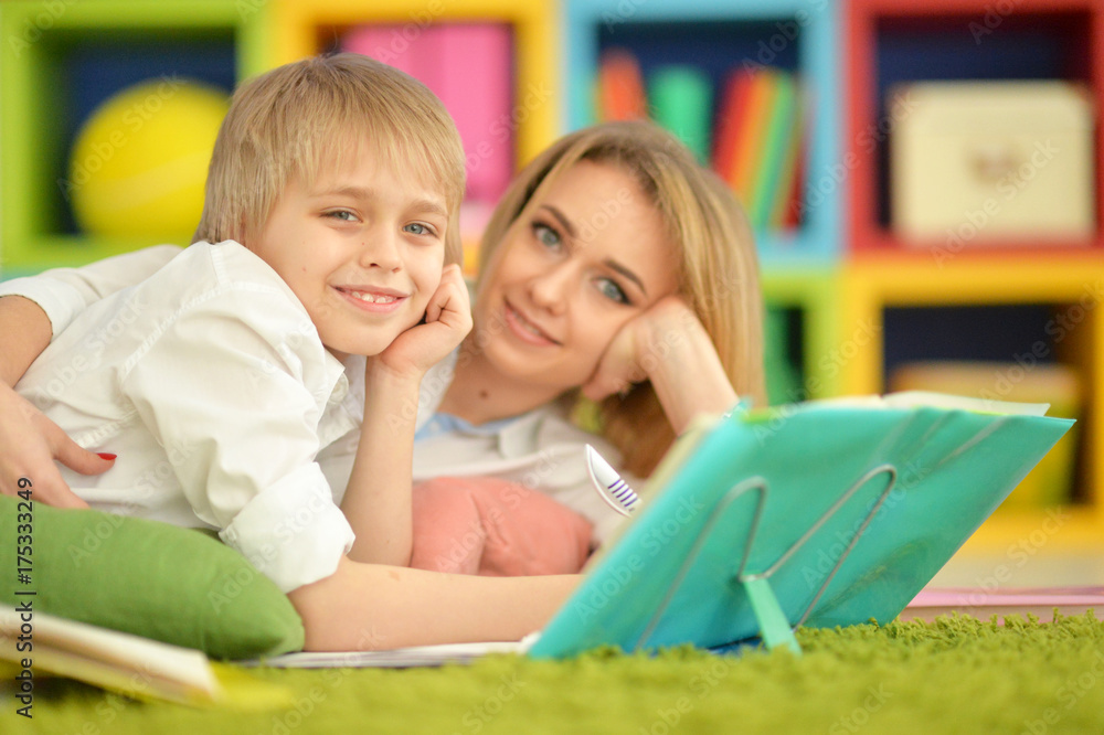 Mother with her son doing homework Mother with her son doing homework