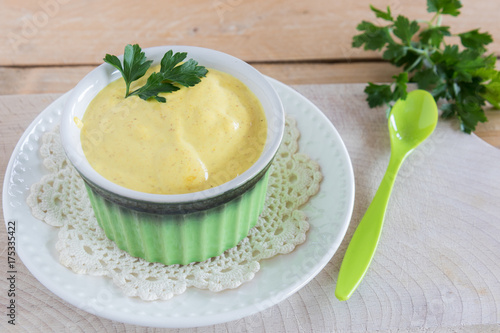 Dense yellow sauce based on yogurt and spices