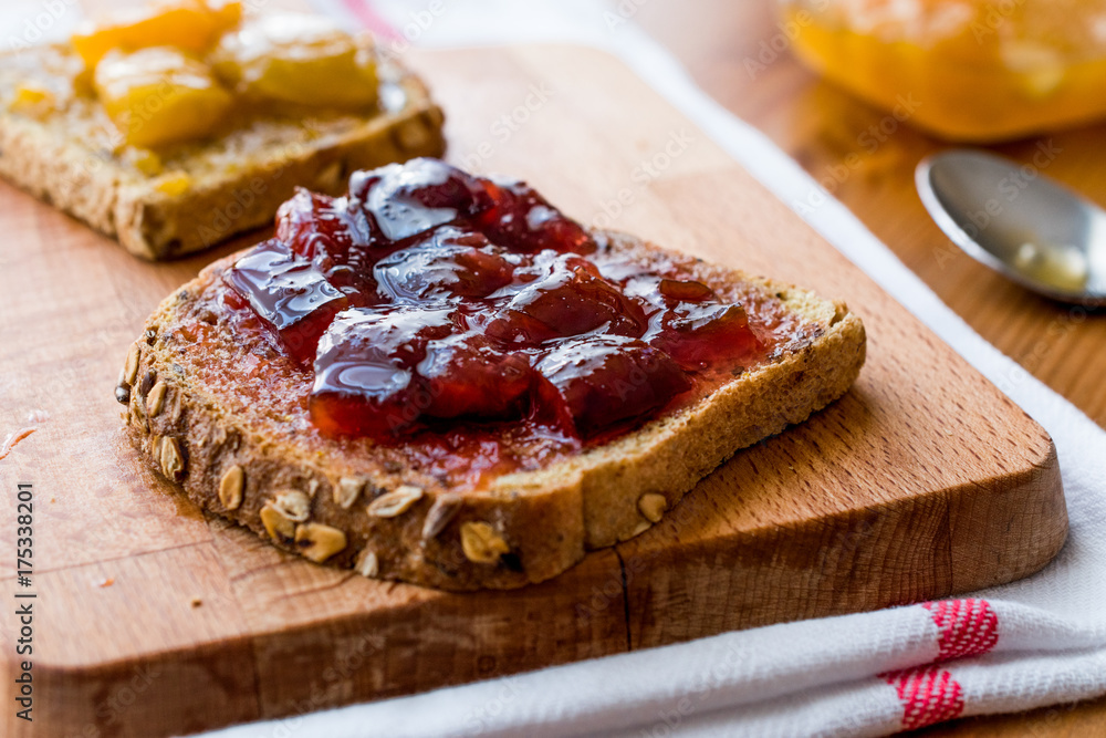 Damson Plum Jam on bread with Apricot jam Damson Plum Jam on bread with Apricot jam