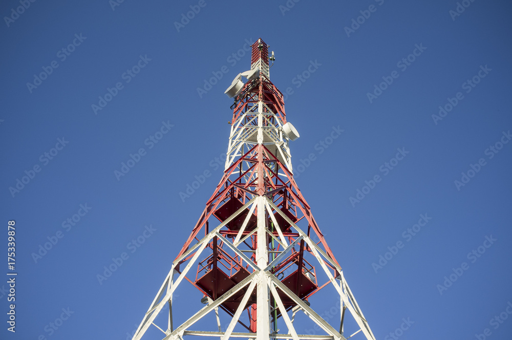 Broadcast relay station antenna over blue sky