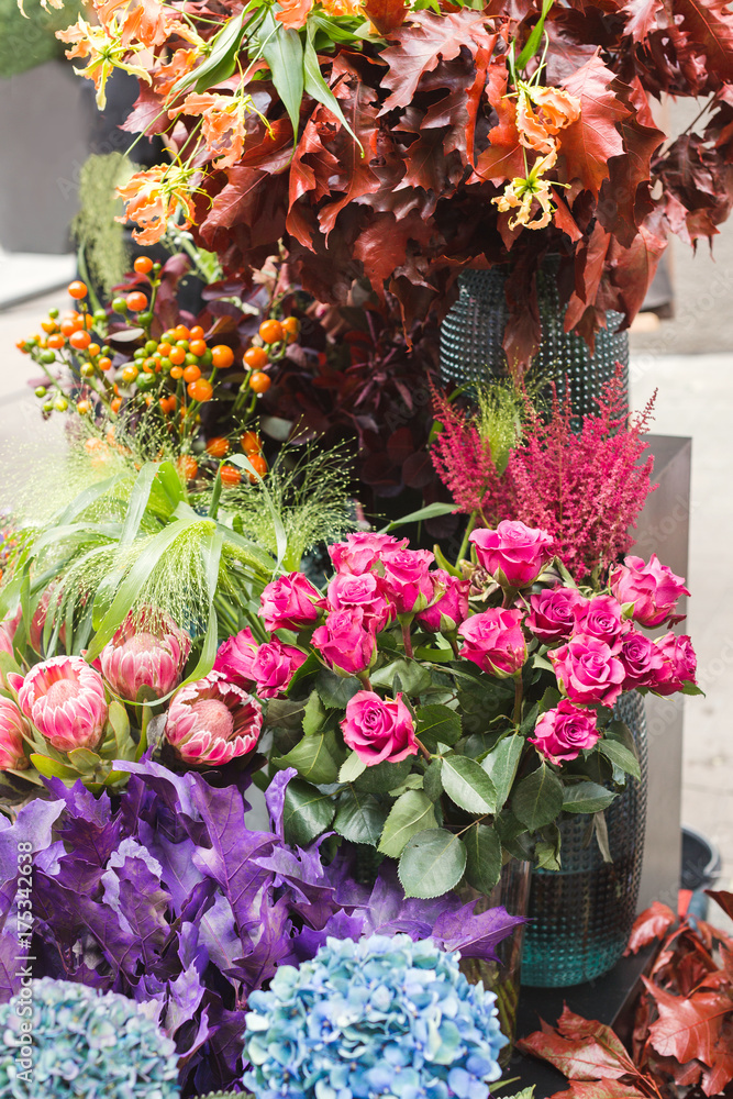 Fototapeta premium Autumn flowers. Autumn bouquets on a flower market.