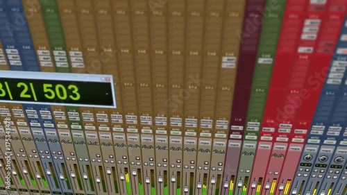 Playback screen of professional pro audio digital audio workstation displaying a view at a song created in a studio with sound design and engineering elements, recording clips and waveforms