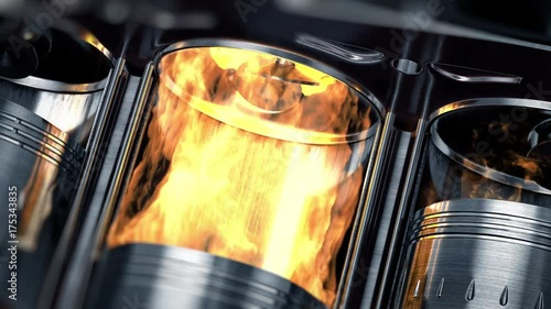A close-up of engine in slow motion with explosions of fuel photo