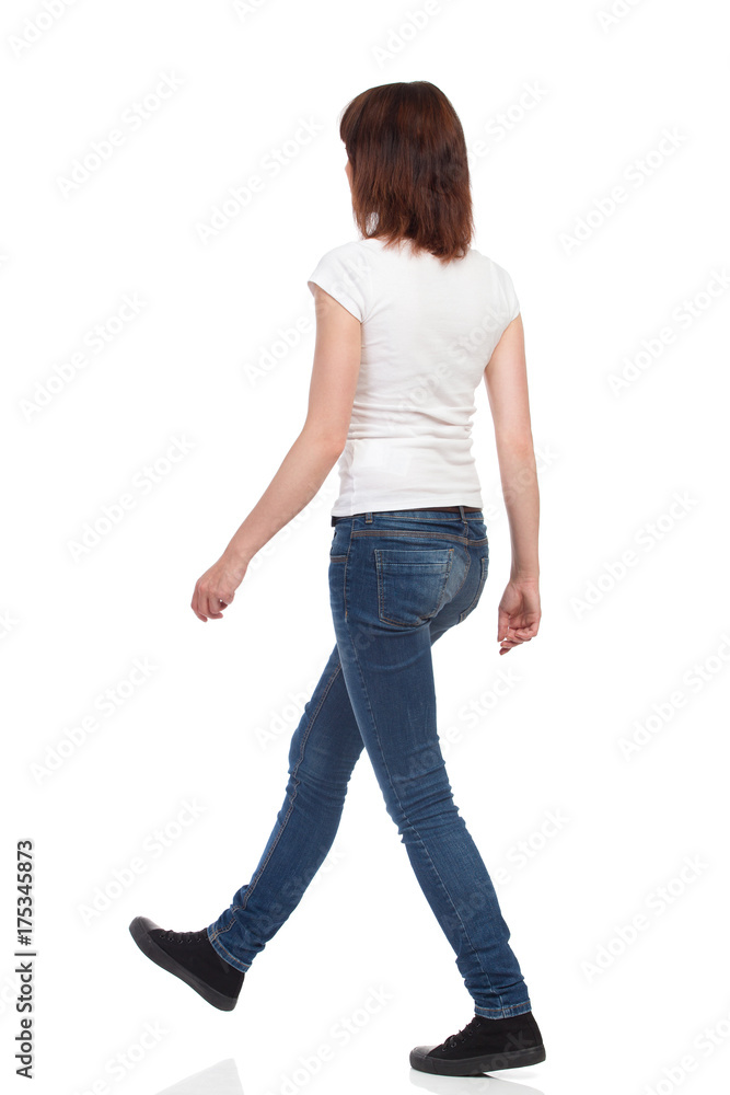 Walking Young Woman. Rear Side View Isolated