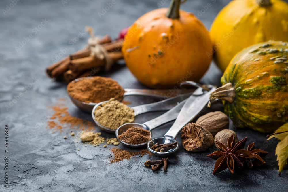 Pumpkin pie spices in measuring cups Pumpkin pie spices in measuring cups