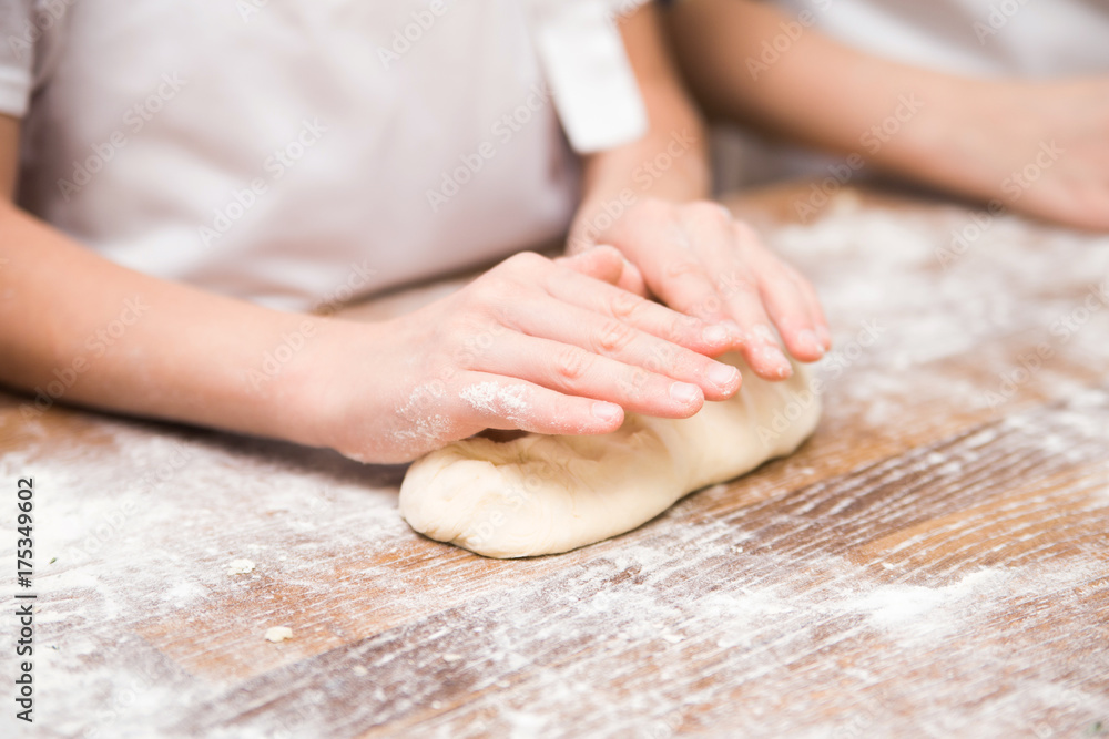 Production of flour products. Hands close up