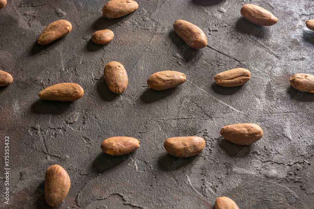 Almond with raisins in a dish of wood Almond with raisins in a dish of wood