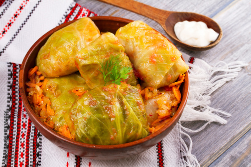 Stuffed cabbage leaves with meat. Cabbage rolls with meat, rice and vegetables. Dolma, sarma, sarmale, golubtsy or golabki, horizontal photo