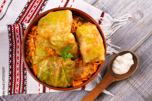 Stuffed cabbage leaves with meat. Cabbage rolls with meat, rice and vegetables. Dolma, sarma, sarmale, golubtsy or golabki. View from above, top, horizontal photo