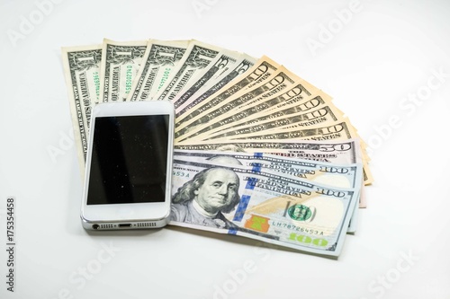 Wallpaper Mural Mobile smartphone on US dollar banknote, digital money concept Torontodigital.ca