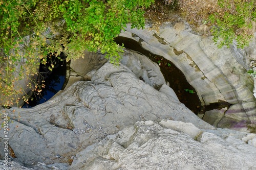 stone dug out of water photo