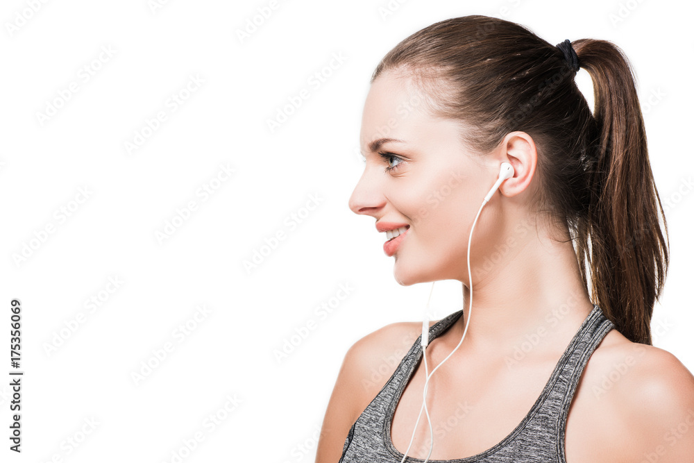 young woman in earphones