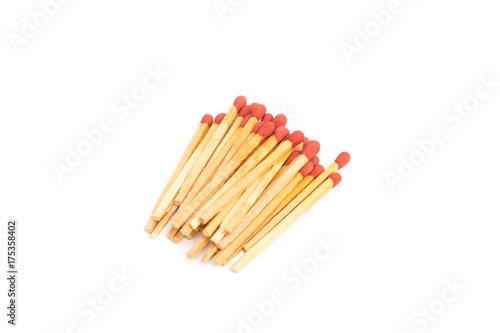 pile of new wooden match sticks on white background