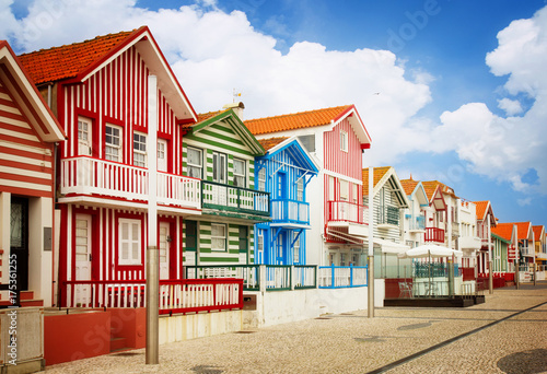street with typical striped houses Costa Nova, Aveiro, Portugal, retro toned