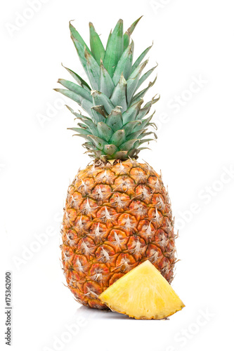 pineapple with a slice isolated on white