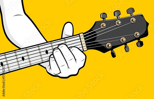 Man hand playing guitar A minor chord