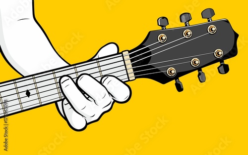 Man hand playing guitar F chord