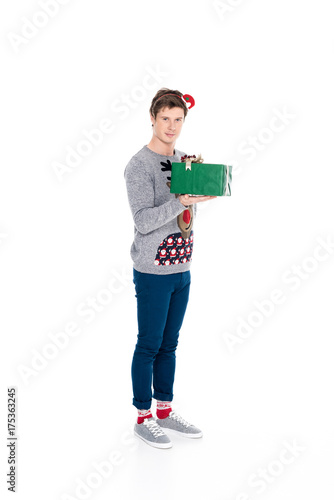 man with christmas present © LIGHTFIELD STUDIOS
