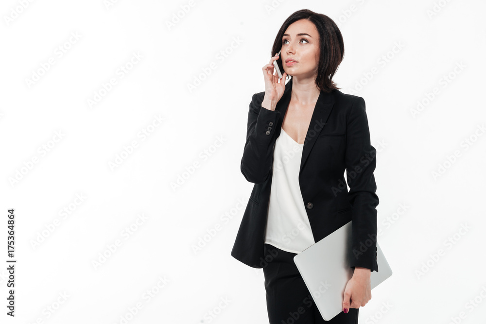Portrait of a smart young businesswoman in a suit Portrait of a smart young businesswoman in a suit