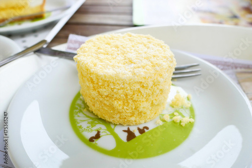 Close up japanese double fromage cheese cake on white plate background.