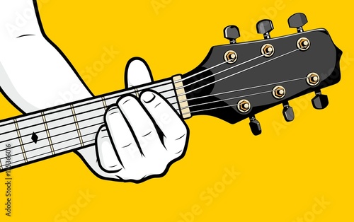 Man hand playing guitar E minor chord