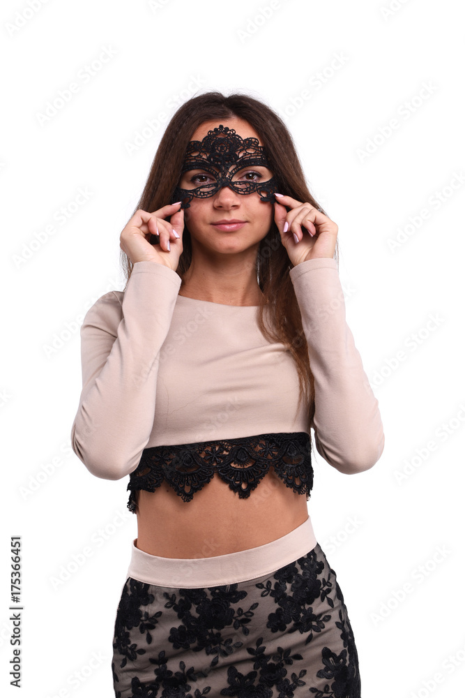 Cute brunette girl with black mask