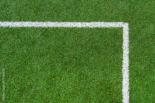 Sports field with artificial grass and white markings