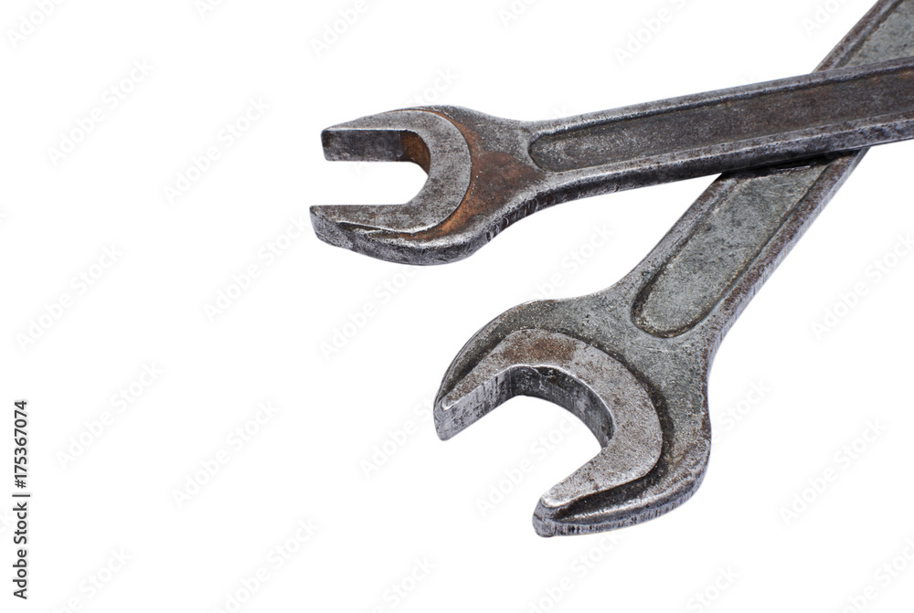 Shabby spanners closeup on white background Shabby spanners closeup on white background