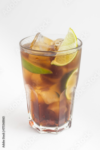 Rum coke cocktail isolated on white background
