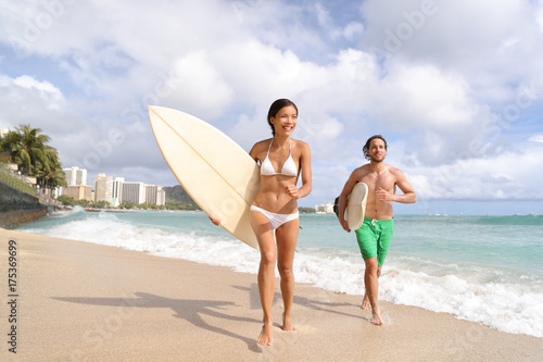 Photography Hawaii Waikiki beach surfers having fun going surfing