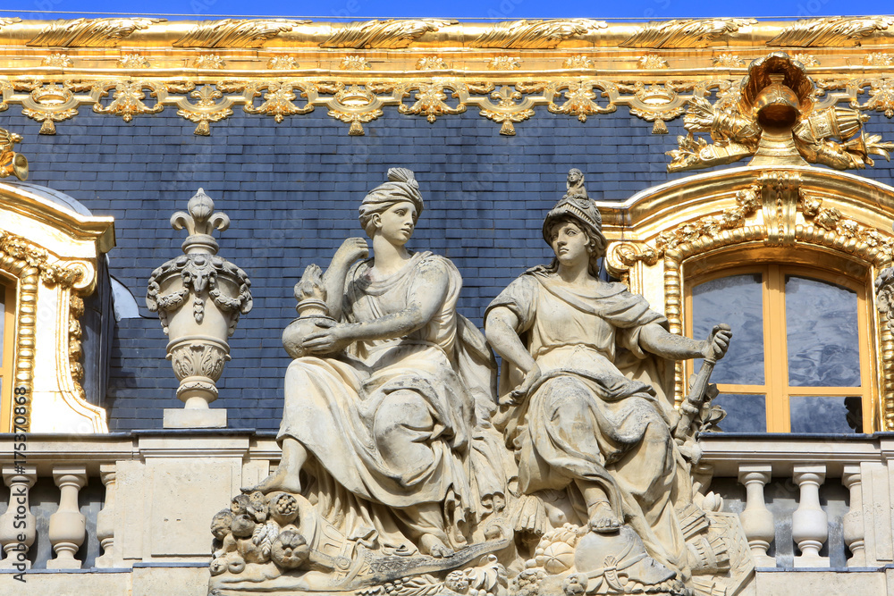Sculptures on the roof of a building from the Cour de Marbre (Marble Courtyard) renovated in 2008. Palace of Versailles.