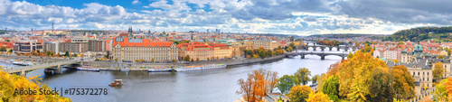 Scenic view of Prague, bridges and Vltava river from Latensky garden in the autumn. Panorama