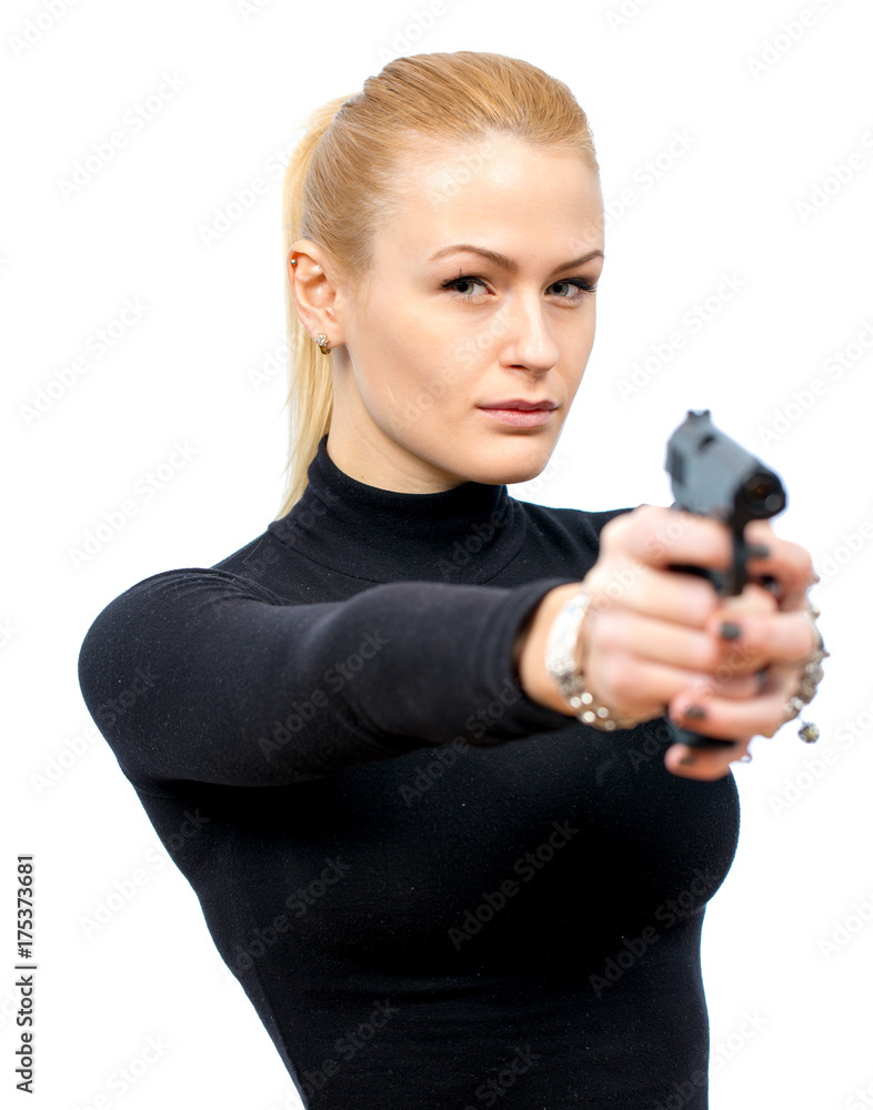 Young blonde woman in a black suit with a gun Young blonde woman in a black suit with a gun