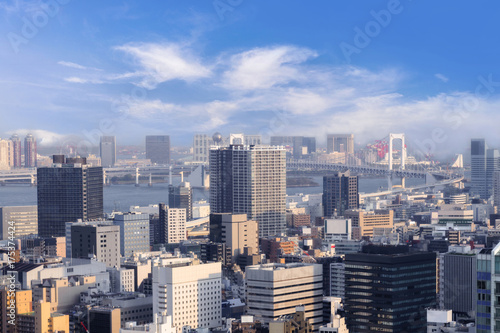 Cityscapes of Tokyo, city aerial skyscraper view of office building and downtown and street of  minato in tokyo with blue sly and clouds background. Japan, Asia