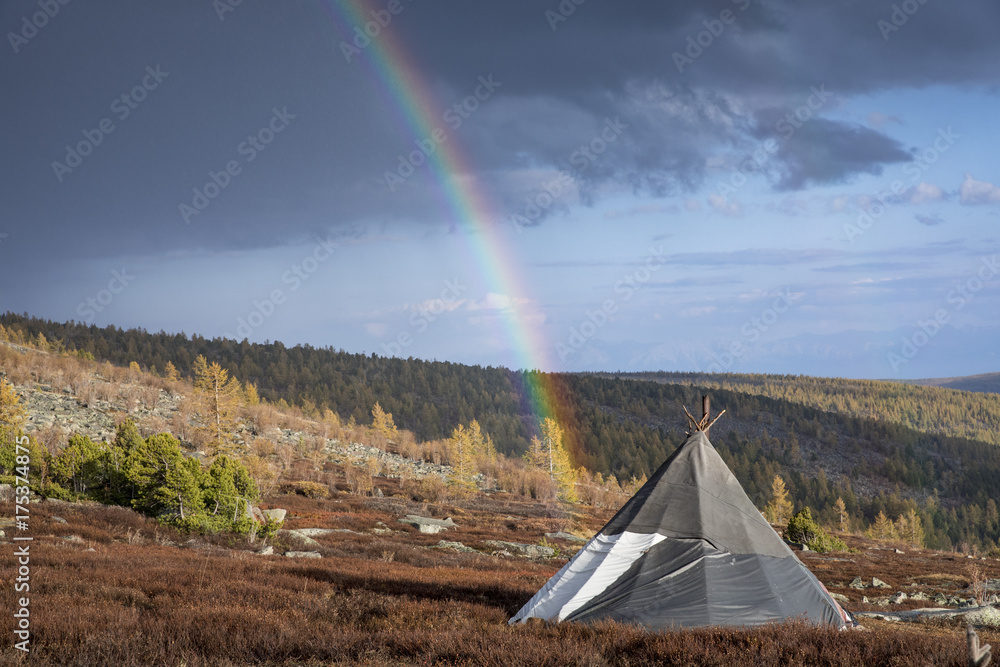 tsaatan yurt and a rainbow in a landscape of northern Mongolian taiga
