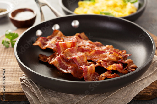 Cooked bacon on a skillet