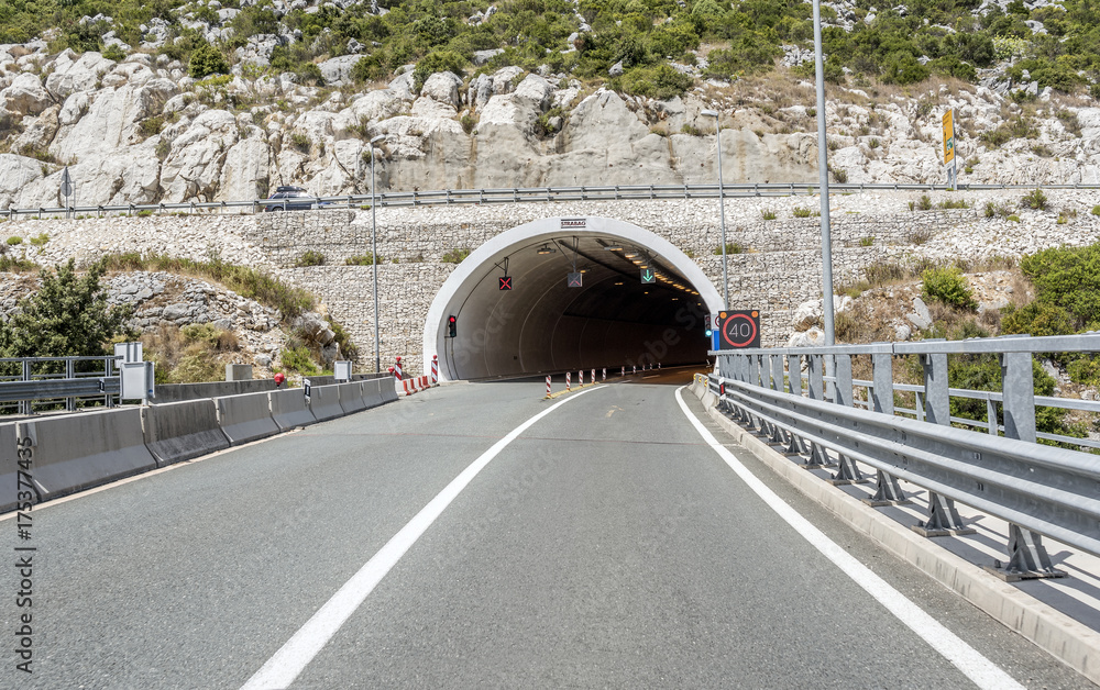 Fototapeta Tunnel through the mountain.
