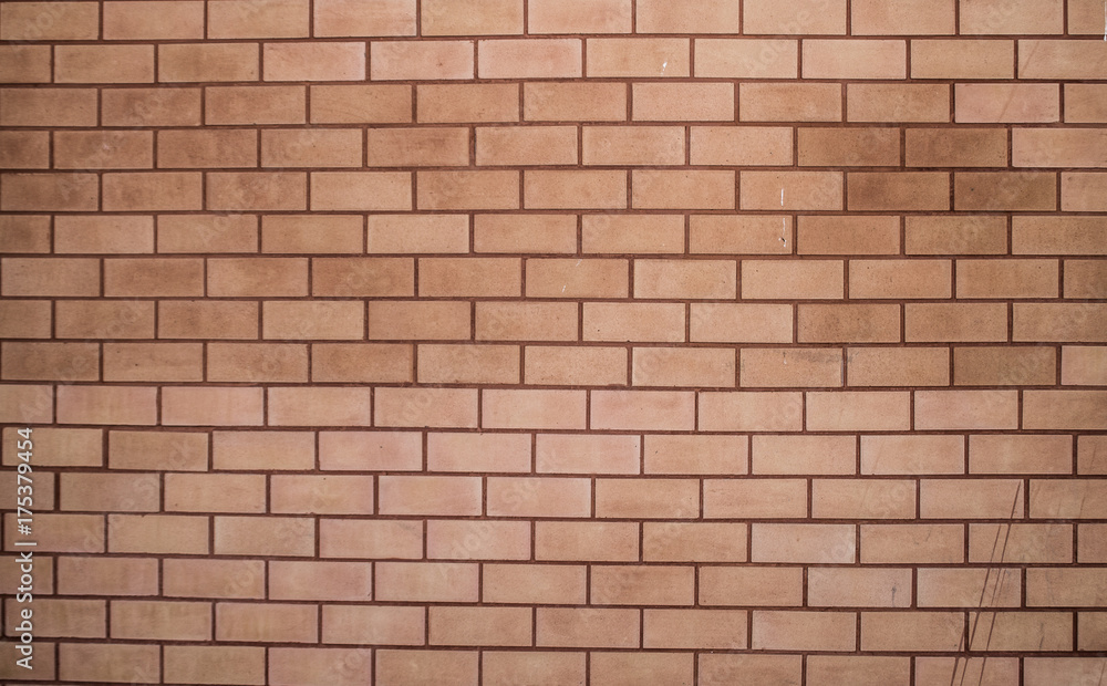 Old brick wall with orange stains. Have light for background or wallpaper. Old brick wall with orange stains. Have light for background or wallpaper.