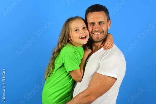 Girl and man with happy faces isolated on blue background.