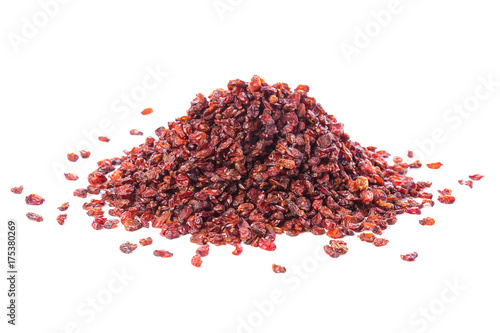 Dried raisins on a white background