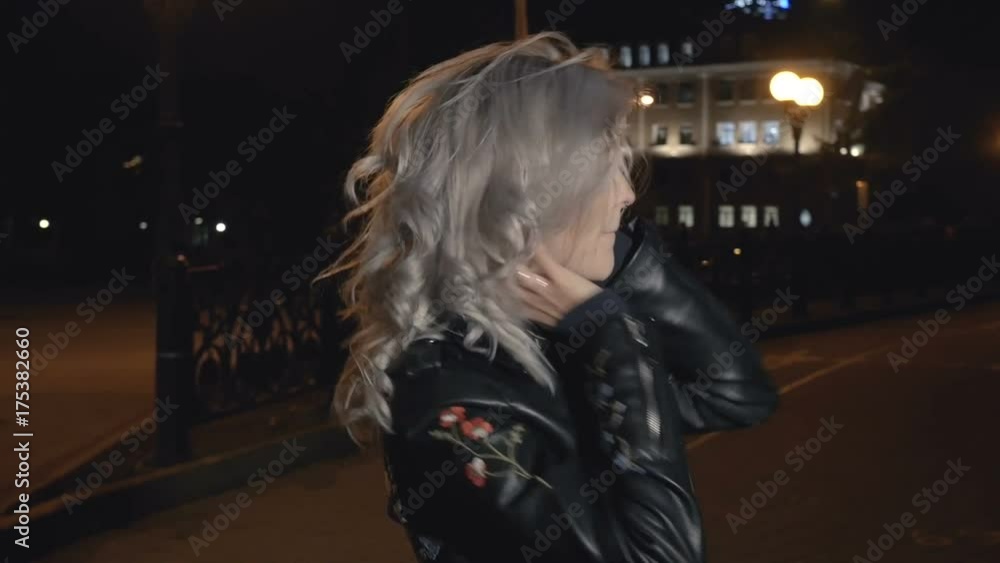 Woman disarranging her hair