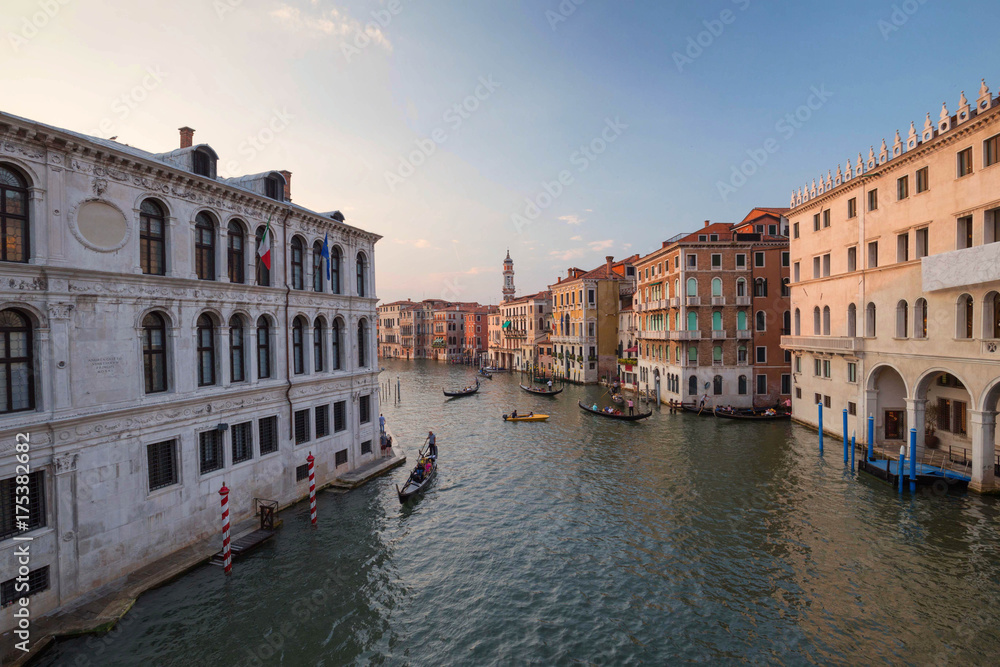 Venice / Sunset view of the river canal and traditional venetian architecture